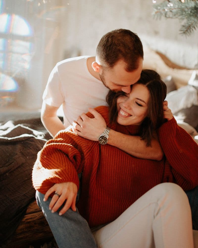 Happy couple embracing, representing discreet men's health care
